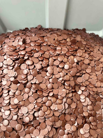 Bucket full of chocolate drops for snacking