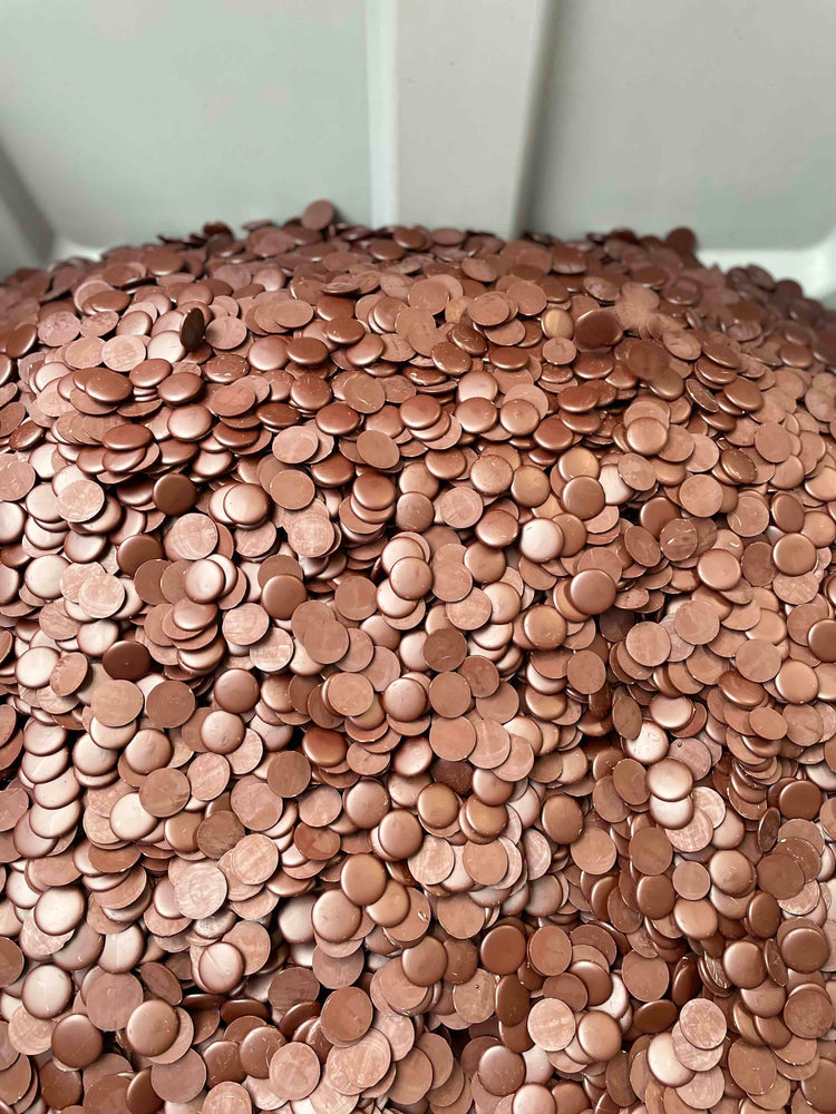 Bucket full of chocolate drops for snacking